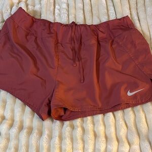 Nike Women's Athletic Shorts in Rust